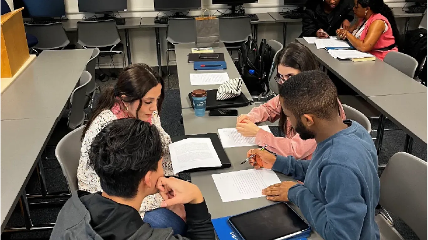 students working together at a table 