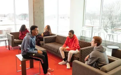 students talking in a lounge